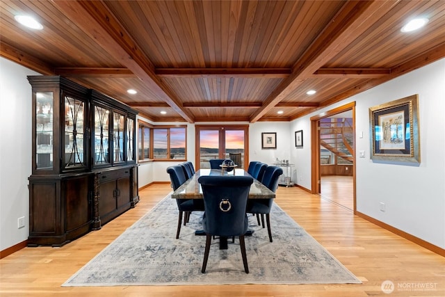 dining space with light wood finished floors, baseboards, beam ceiling, and recessed lighting