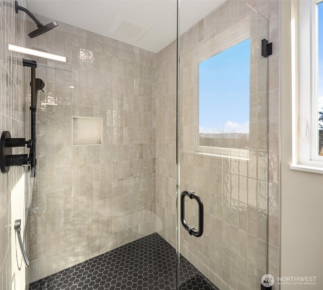 bathroom with a stall shower