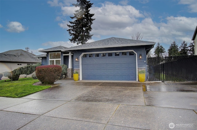 view of front of property with stone siding, concrete driveway, a garage, and fence