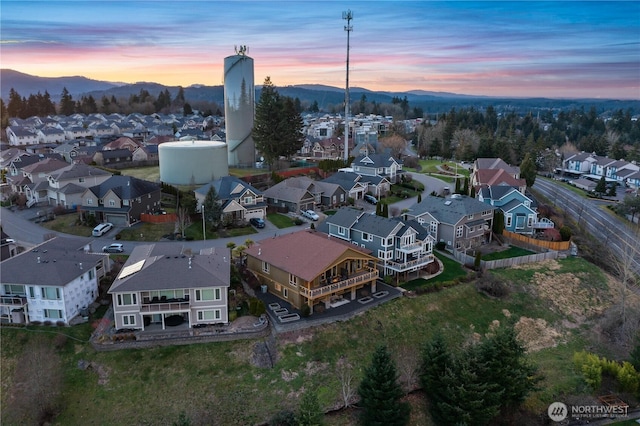 bird's eye view featuring a residential view and a mountain view