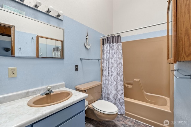 full bath with vanity, toilet, and shower / tub combo with curtain