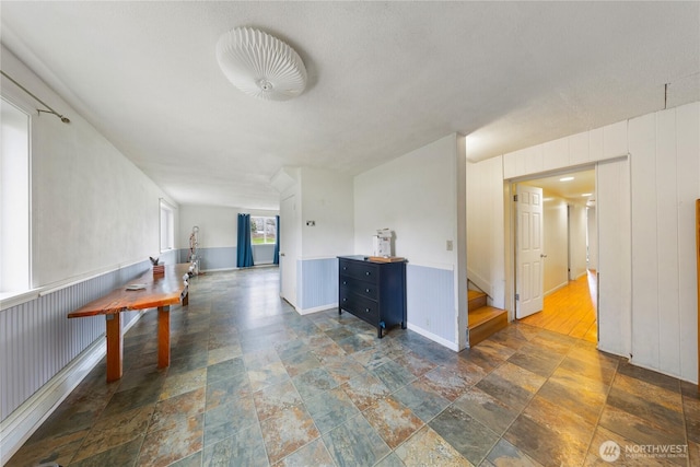 interior space featuring stone finish floor