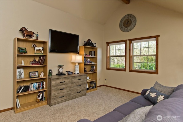 carpeted living room featuring vaulted ceiling and baseboards