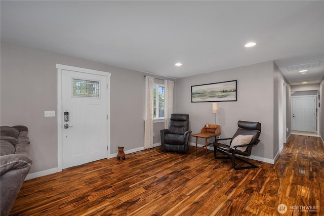 entrance foyer with visible vents, baseboards, wood finished floors, and recessed lighting