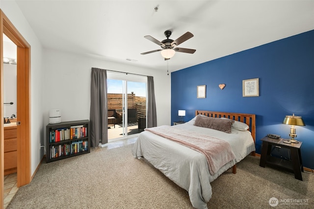 bedroom featuring access to exterior, visible vents, carpet floors, and a ceiling fan