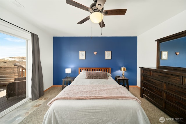 bedroom with access to exterior, visible vents, baseboards, and a ceiling fan