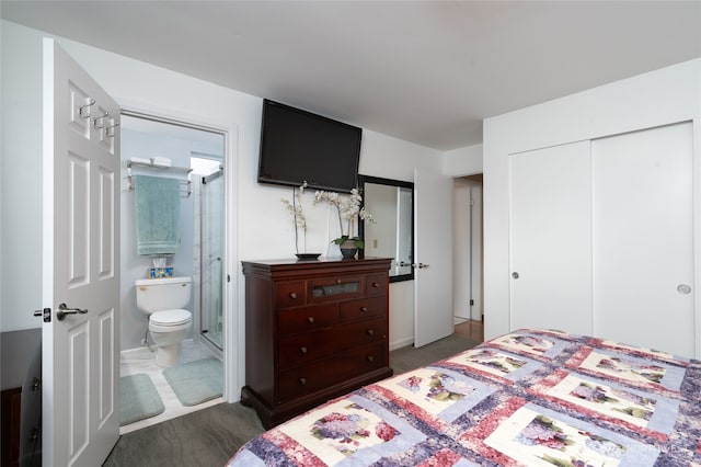 bedroom with a closet and ensuite bathroom