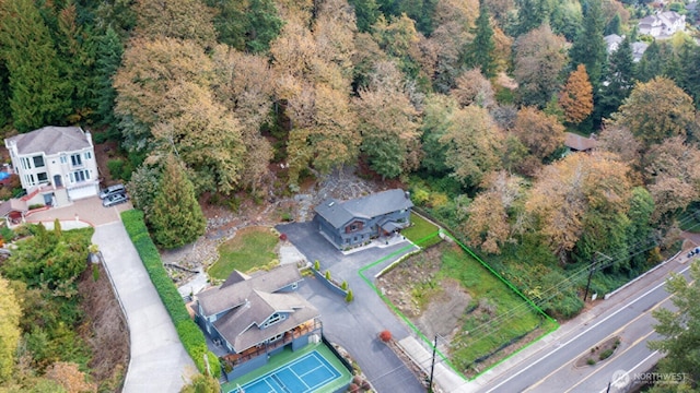 drone / aerial view with a forest view