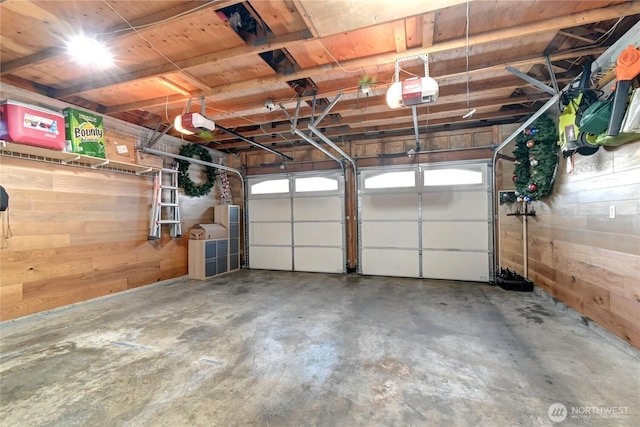 garage featuring a garage door opener