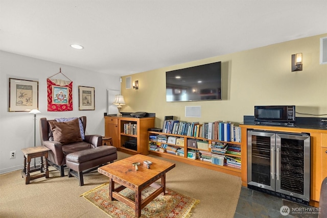 living area with wine cooler, baseboards, and recessed lighting