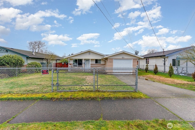 view of front of house featuring driveway, a front lawn, and fence private yard