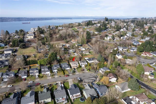 aerial view featuring a water view and a residential view