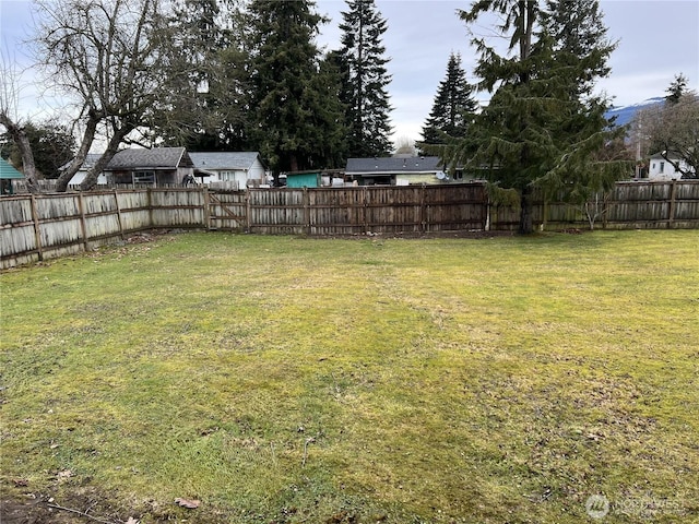 view of yard with fence