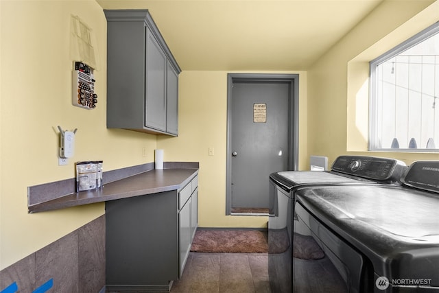 laundry area with cabinet space and washer and dryer