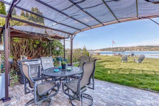 10008 Rainier Ave S, Seattle, WA 98178 - view of patio featuring a pergola and a water view