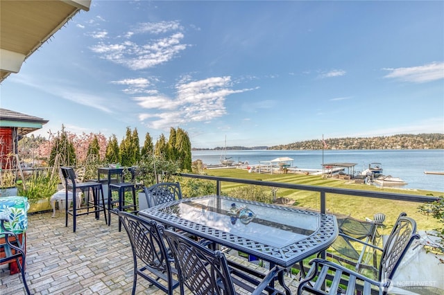 10008 Rainier Ave S, Seattle, WA 98178 - balcony with outdoor dining space, a patio, and a water view