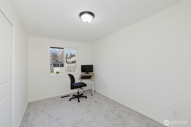 office area with carpet and baseboards