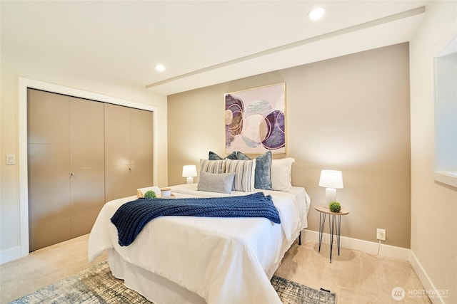 bedroom with carpet floors, baseboards, a closet, and recessed lighting