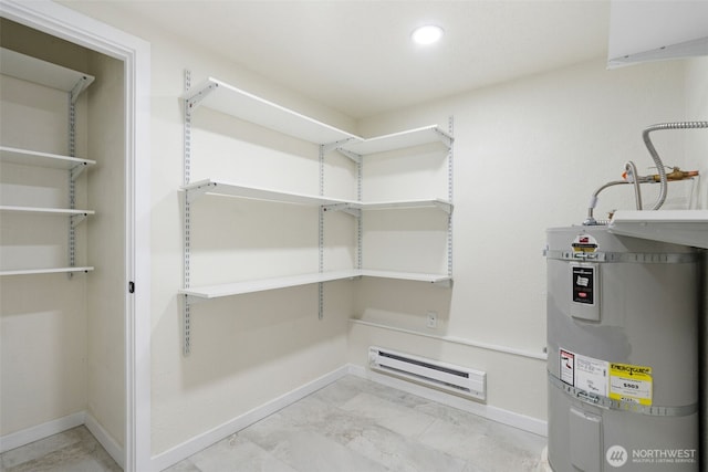 utility room featuring secured water heater