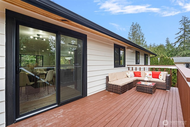 wooden deck with outdoor lounge area