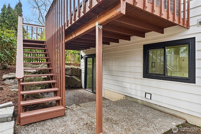 view of property exterior with stairs