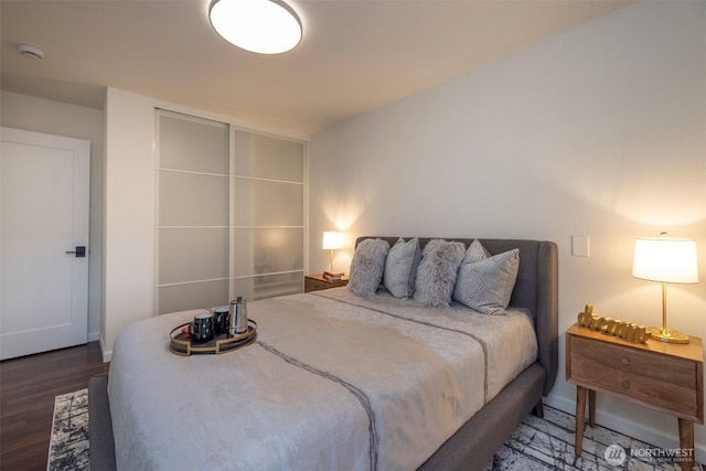 bedroom with wood finished floors