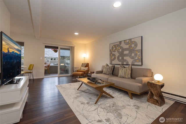 living area with dark wood-style floors, recessed lighting, baseboards, and a baseboard radiator