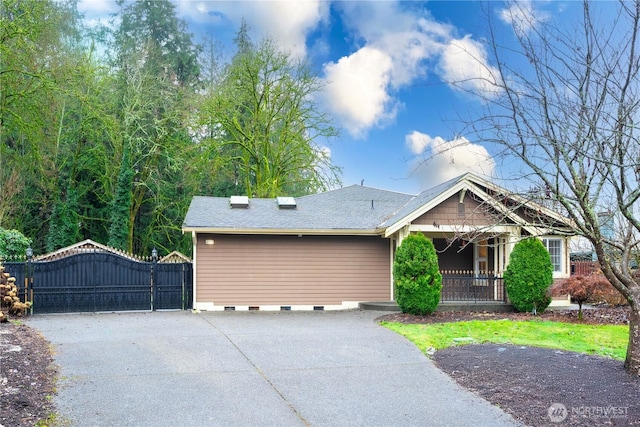 view of front of property featuring roof with shingles, covered porch, crawl space, a gate, and driveway