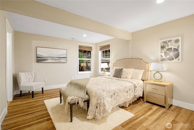 bedroom with recessed lighting, light wood-type flooring, visible vents, and baseboards