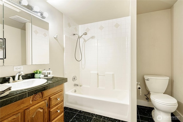 full bathroom with toilet, tile patterned flooring, shower / bathing tub combination, and vanity