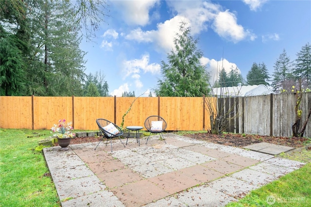 view of patio with a fenced backyard