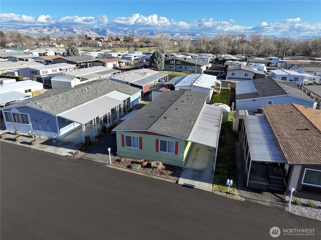 aerial view with a residential view and a mountain view