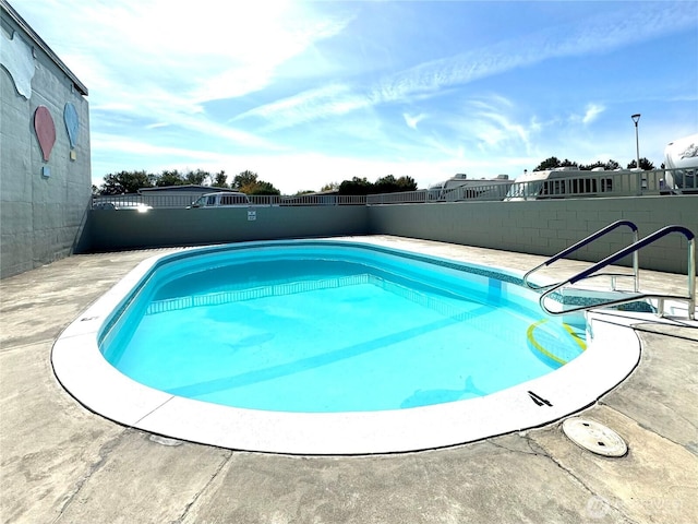 1427 Topaz St, Walla Walla, WA 99362 - view of swimming pool featuring a patio, a fenced backyard, and a fenced in pool