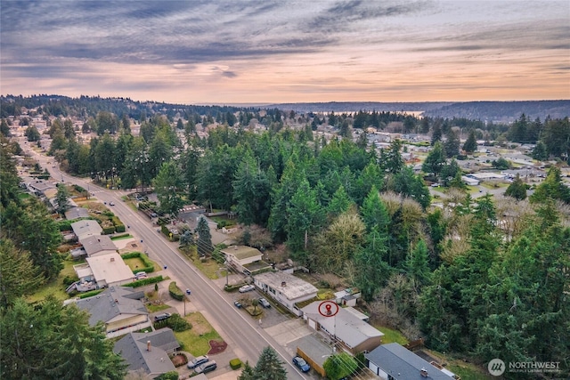 view of aerial view at dusk