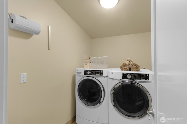 laundry area featuring laundry area and washer and dryer