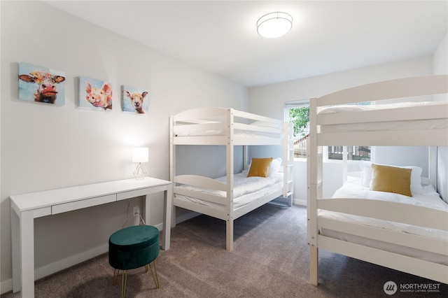 carpeted bedroom with baseboards