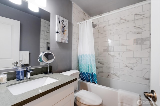 full bathroom with vanity, shower / bath combination with curtain, and toilet