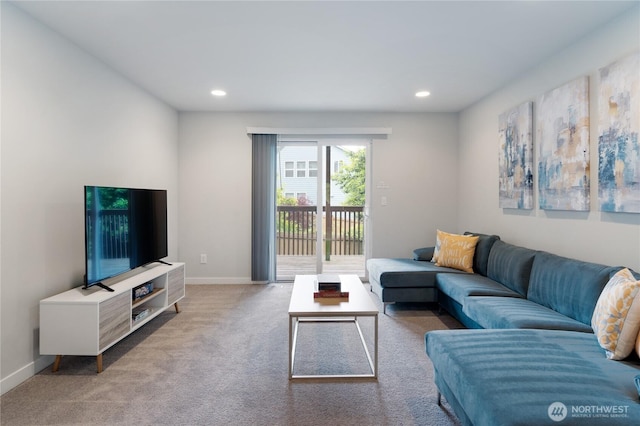 living area with baseboards, recessed lighting, and light colored carpet