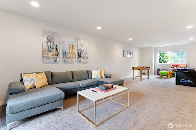 living area with carpet floors, baseboards, and recessed lighting