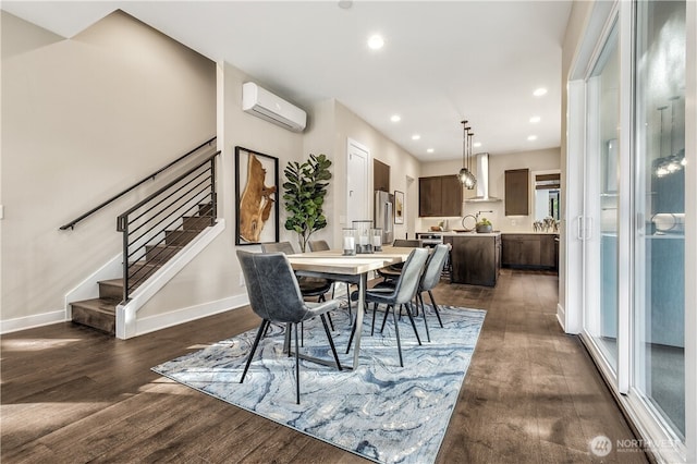 dining space with baseboards, dark wood-style flooring, stairs, a wall mounted AC, and recessed lighting