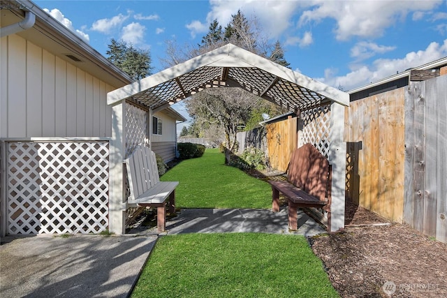 view of yard with fence