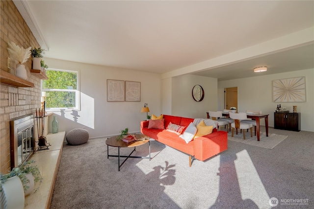 living area with carpet floors and a fireplace