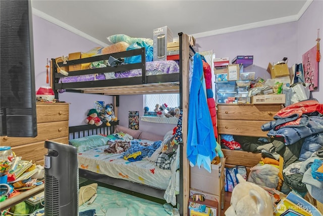 bedroom with ornamental molding