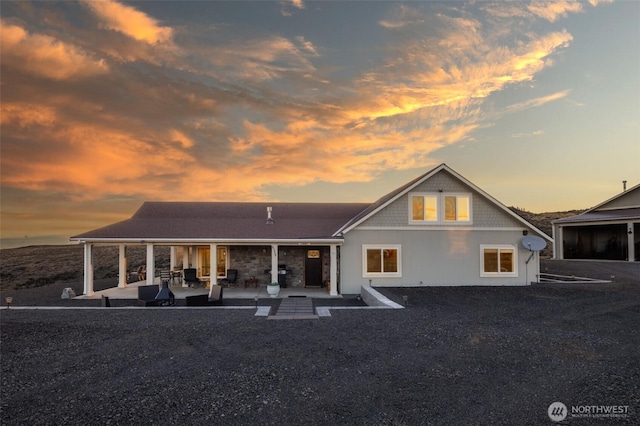 back of house with a patio area