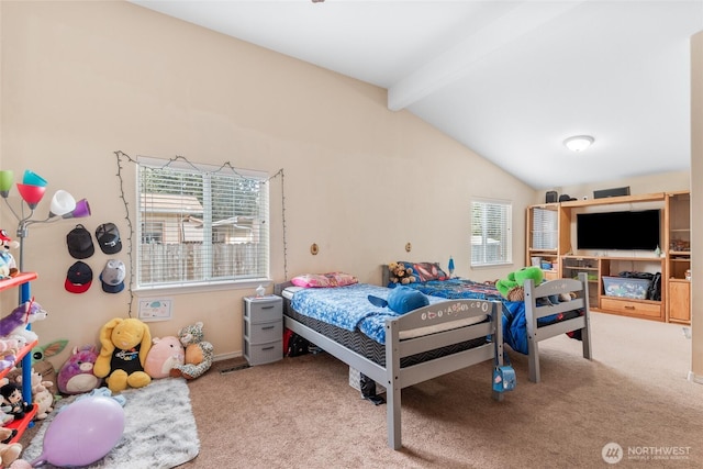 carpeted bedroom with lofted ceiling with beams