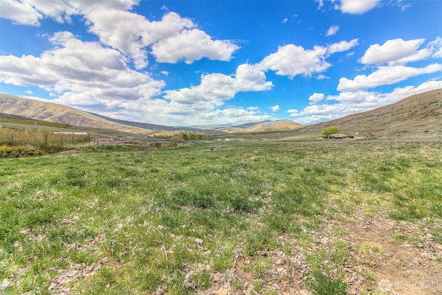 mountain view featuring a rural view