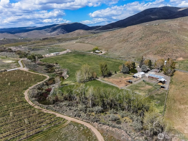 aerial view featuring a mountain view and a rural view