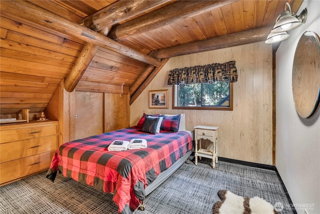 bedroom with vaulted ceiling with beams, carpet, wooden ceiling, and wooden walls