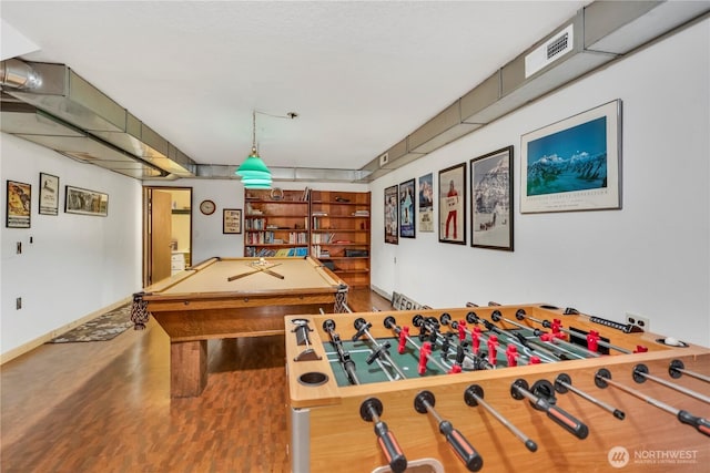 rec room with visible vents, baseboards, wood finished floors, and pool table