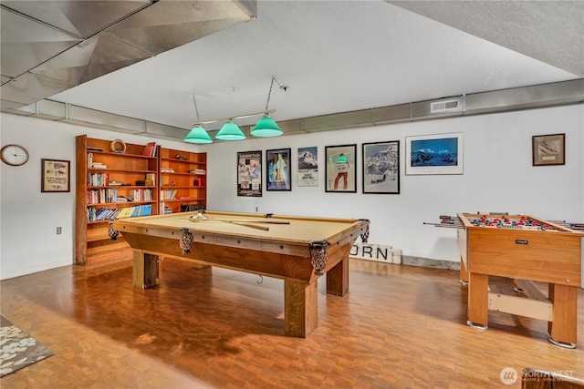 rec room with pool table, visible vents, a textured ceiling, and baseboards